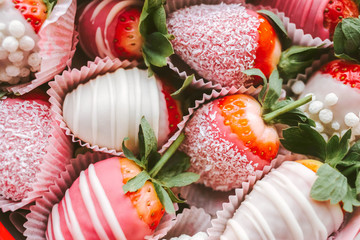 Strawberries dipped in chocolate Set of fresh strawberries in sugar icing Close-up photo