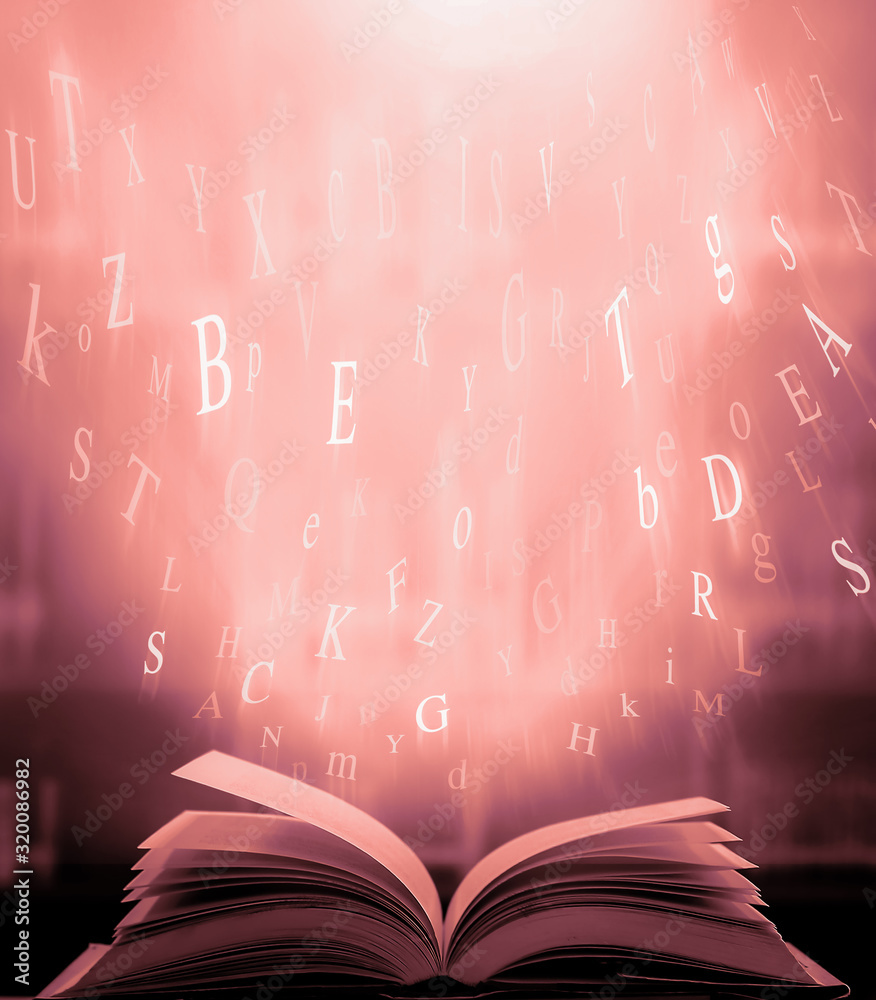 Poster open book on the table and english alphabet floating above the book in the library and blur bookshel