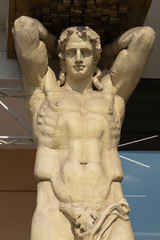 Fototapeta na wymiar Atlas naked man statue, Greek square, Odessa, Ukraine