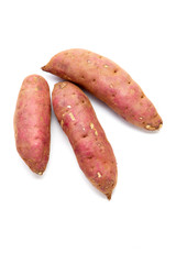 japanese sweet potatoes on white background