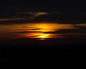 Clouds and sky lit by a winter sunset