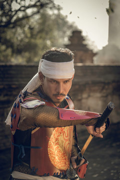 Samurai in the Ayutthaya period Wearing a warrior suit with armor By using a sword to fight