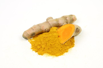 Turmeric powder and turmeric root extract on a white background, used as a tonic for body and food ingredients.