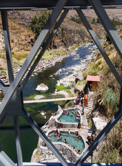Arequipa/Peru: Colca river and thermal waters, from the steel bridge. Famous touristic site in...