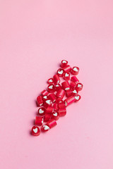 Colorful Valentines Day candy hearts  on pink background