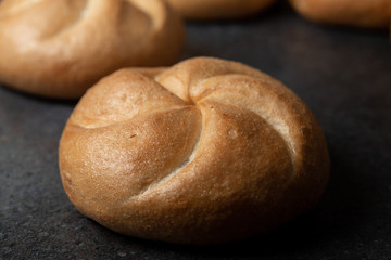 Crusty round bread rolls, known as Kaiser or Vienna rolls