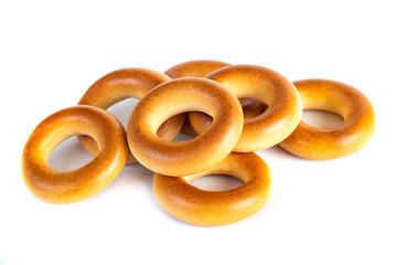 Small dry bagels, small rolls on a white background