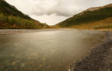Savage River Loop Trail at sunset at Denali National Park, Alaska, USA.  The river is along the Savage River Trail loop which is open all year around.