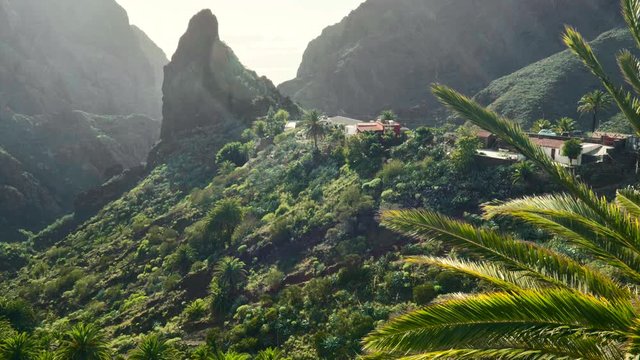 Sunset view of Masca valley and Masca village on Tenerife island, Canary, Spain. Gimbal shot, 4K