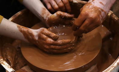 potter's wheel. production of ceramic products from clay.