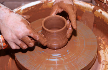 potter's wheel. production of ceramic products from clay.