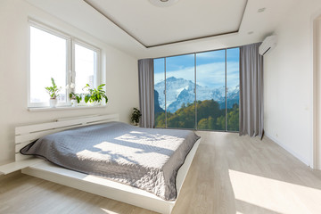panoramic view of nice cozy bedroom with summer outdoor.