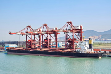 Type of cargo terminal and cranes, berths for transshipment of bulk cargo, iron ore and coal. Port...