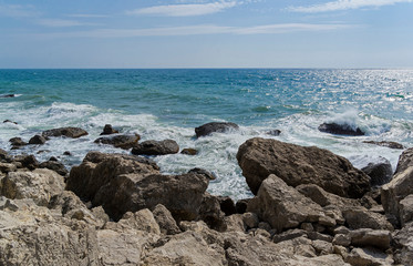 Fototapeta na wymiar Strong surf on the rocky seashore. Crimea