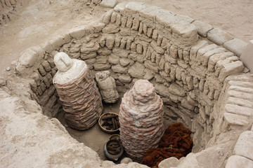 Lima/Peru: replicas of mummies in Huaca Pucllana Archeological Site, in Miraflores