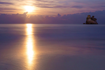 tramonto isola riflesso mare setoso