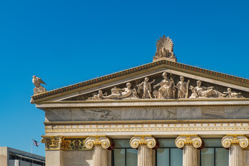 Neoclassical facade and marble columns, entrance of Academy of Athens, Greece. Bottom view
