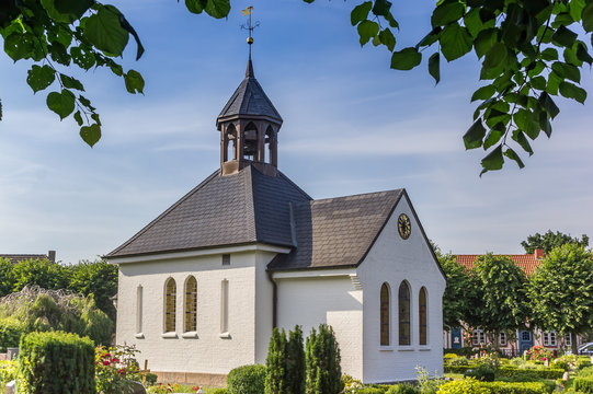  Little white chapel in Holm village of Schleswig, Germany