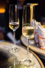 A glass of Champagne on the table