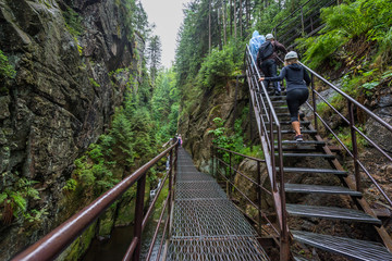 AUGUST 4, 2019 - POLAND: Tourists climbing up to the metal stairs out of gorge next to Kamienczyk...