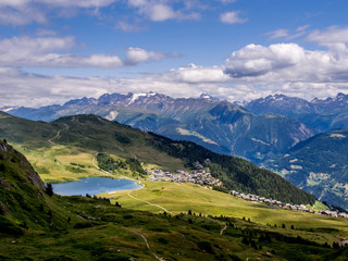 Fototapeta na wymiar Bettmersee lake and Bettmeralp village in the canton of Valais Switzerland