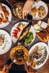 A generous and hospitable table with Ukrainian national traditional vegetable and meat dishes served to the New Year holidays, Christmas, Easter and treats for friends birthday. Top view