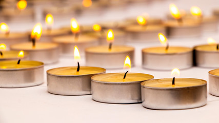 Lighted candles while honoring the memory of heroes_