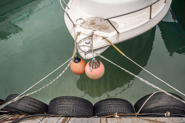 Reflection of a ship with red balls