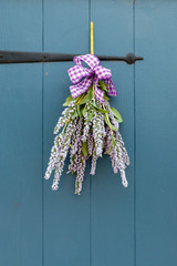 blue door with lavender decoration