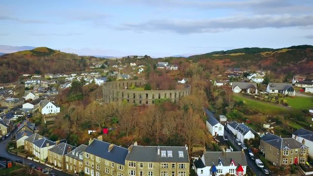 Flying toward the Coliseum in Oban, Scotland and tilting down into the Coliseum.