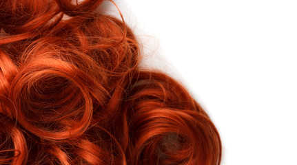 curls of bright red hair isolated on white