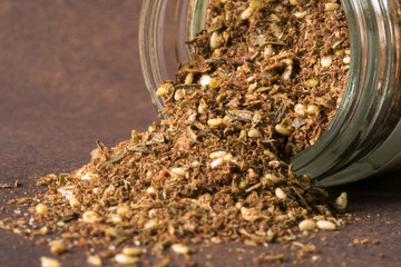 Za'atar Seasoning Spilled from a Spice Jar