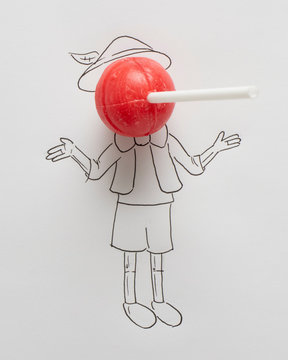 Conceptual boy with a long nose