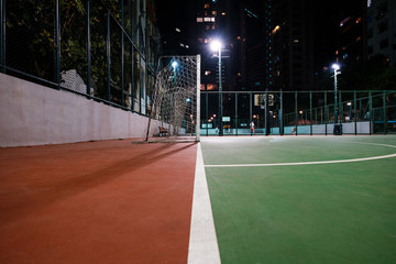 soccer court in city, sports field at night