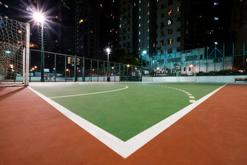 soccer court in city, sports field at night