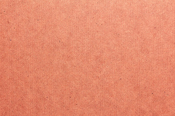 Sheet of hardboard with a pink tinge