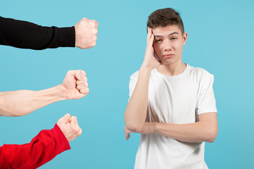 concept of a threat from hooligans towards a schoolboy.