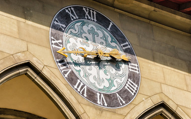 Clock as a fragment of outdoor decor at City hall building in Bern, Bern-Mittelland district, Switzerland