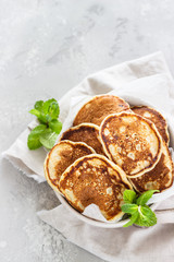 Homemade classic American pancakes in a ceramic bowl, copy space for text. Healthy breakfast.