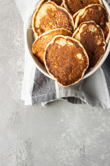 Homemade classic American pancakes in a ceramic bowl, copy space for text. Healthy breakfast.