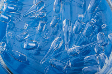 Glass medical ampoule vial for injection. Medicine is liquid sodium chloride with of aqueous...