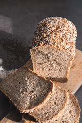 Homemade millet and buckwheat bread slices. Vertical picture.