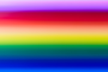 Defocused background of different colored pencils