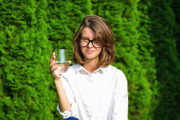 Girl drinking water.