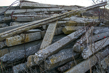Fototapeta na wymiar Old reinforced concrete stakes