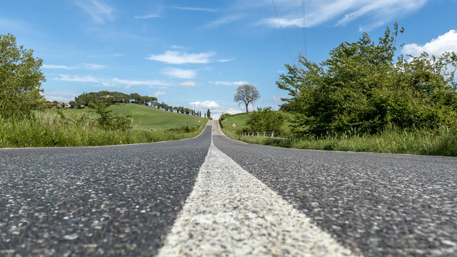 Straight road through rural landscape, Montecatini Val di Cecina, Pisa, Tuscany, Italy