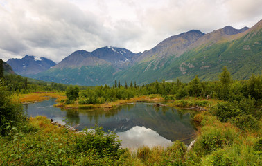 Naklejka na ściany i meble Eagle River nature center at sunrise, Eagle River, Alaska. Forty minutes from downtown Anchorage, Eagle River Nature Center is a gateway to Chugach State Park and a glacial river valley.