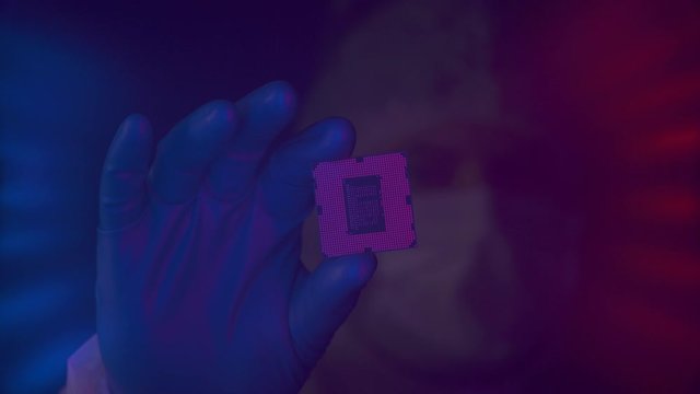 Scientist completed a scientific experiment in biomedicine. Silicon electronic chip in hands of a researcher in a lablaboratory. Engineer testing experimental innovation in cyber technology industry.