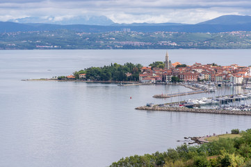 4Aerial view over the sea beautiful Izola town, with old town and harbor