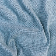 textile and texture concept - close up of crumpled gray cotton fabric background